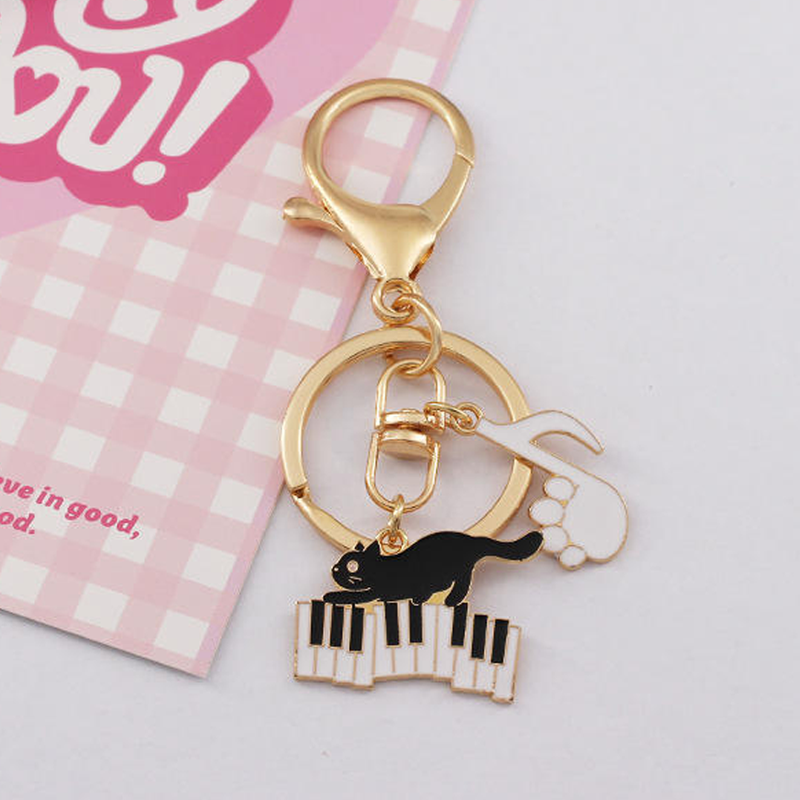 Kitty Cat on Keys with Paw Note Keychain